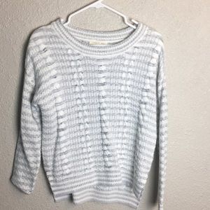 white and grey sweater